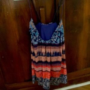 NWT BEBE ruffled cross back mesh tank .